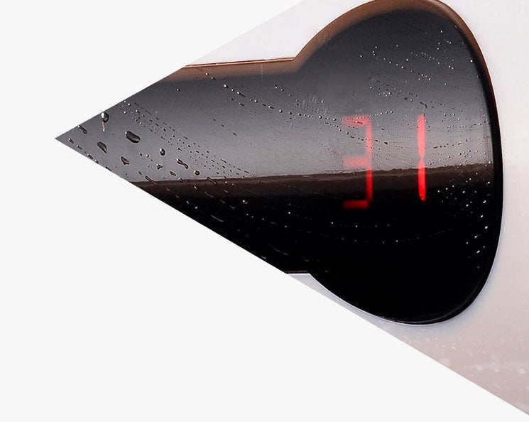 Digital display with raindrops on a white background, featuring the brand 'HANDLE'.