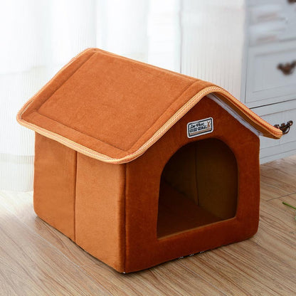 Brown pet house on a wooden floor with a blurred background