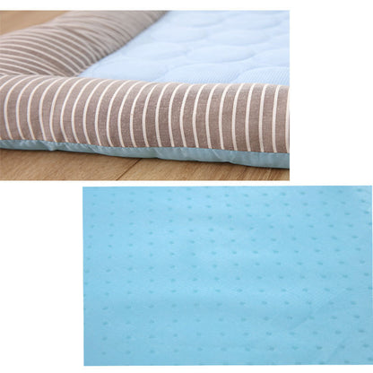 Collage of striped fabric and blue quilted surface