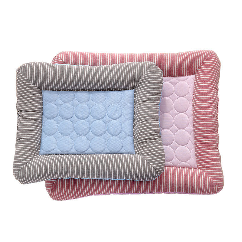 Three quilted pet beds in different colors on a white background