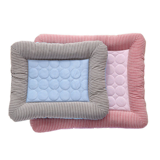 Three quilted pet beds in different colors on a white background