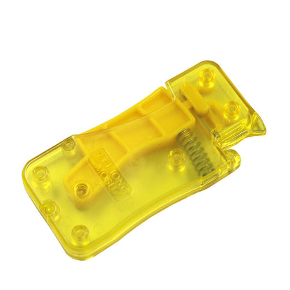 Yellow plastic component on a white background