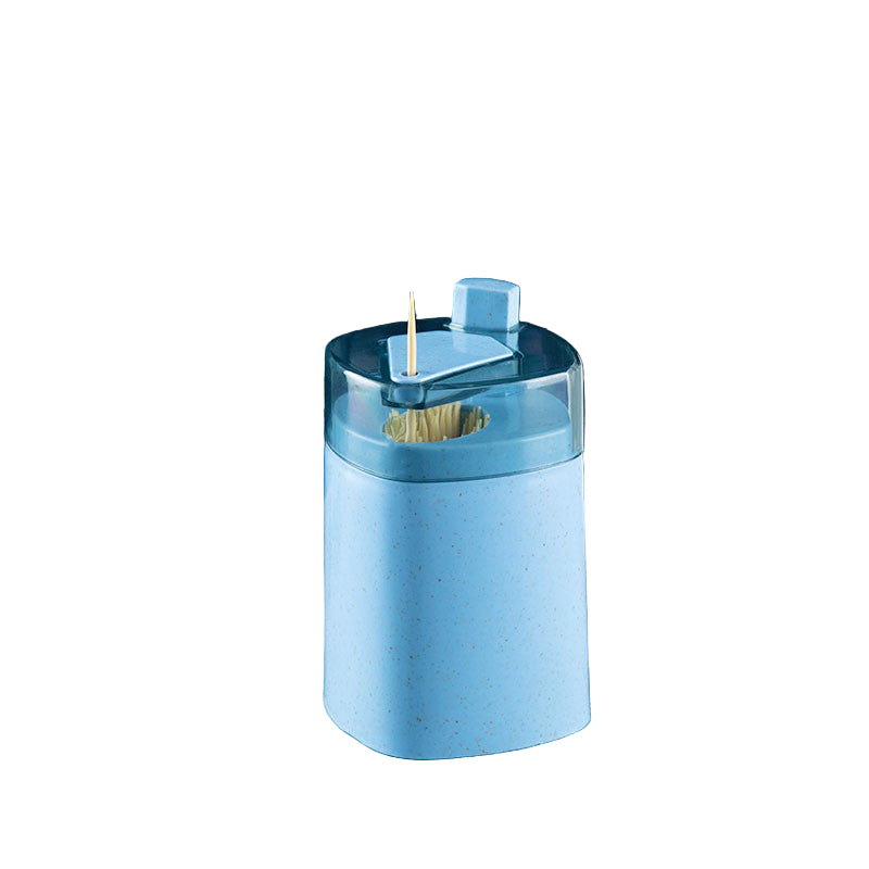 Blue toothpick holder with measurements on a gray surface