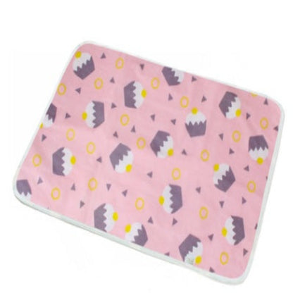 Pink bath mat with castle pattern on a white background