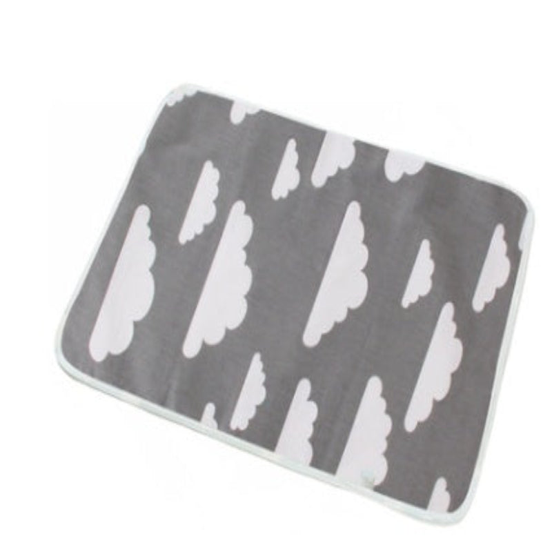 Gray mat with white cloud pattern on a white background