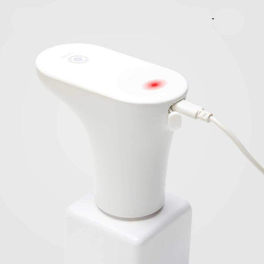 White electronic device with a rechargeable battery indicator on a light gray background