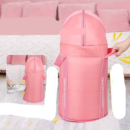 Pink baby seat with text on stability and safety features, placed on a pink couch.