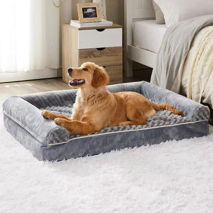 Dog lying on a gray pet bed in a bedroom