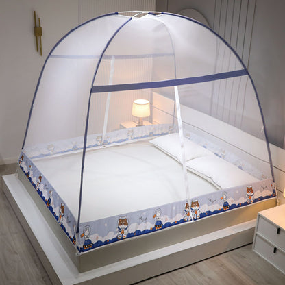 Bed with a mosquito net in a bedroom setting
