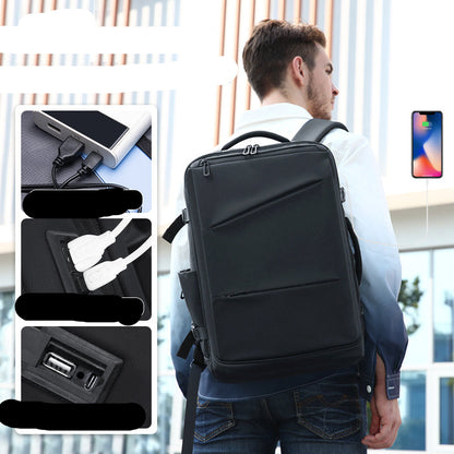 Man carrying a black backpack with USB charging port features highlighted