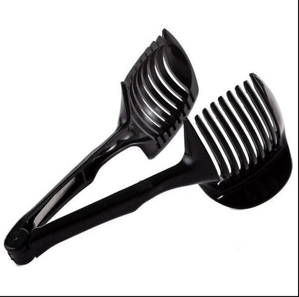 Black hair styling brush with wide and narrow bristle sections on a white background