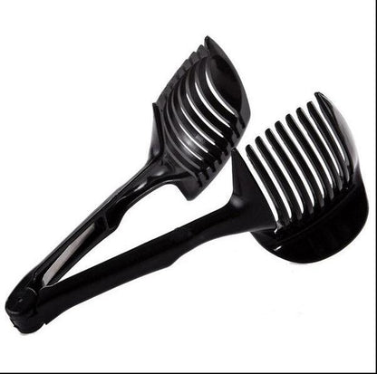 Black hair styling brush with wide and narrow bristle sections on a white background