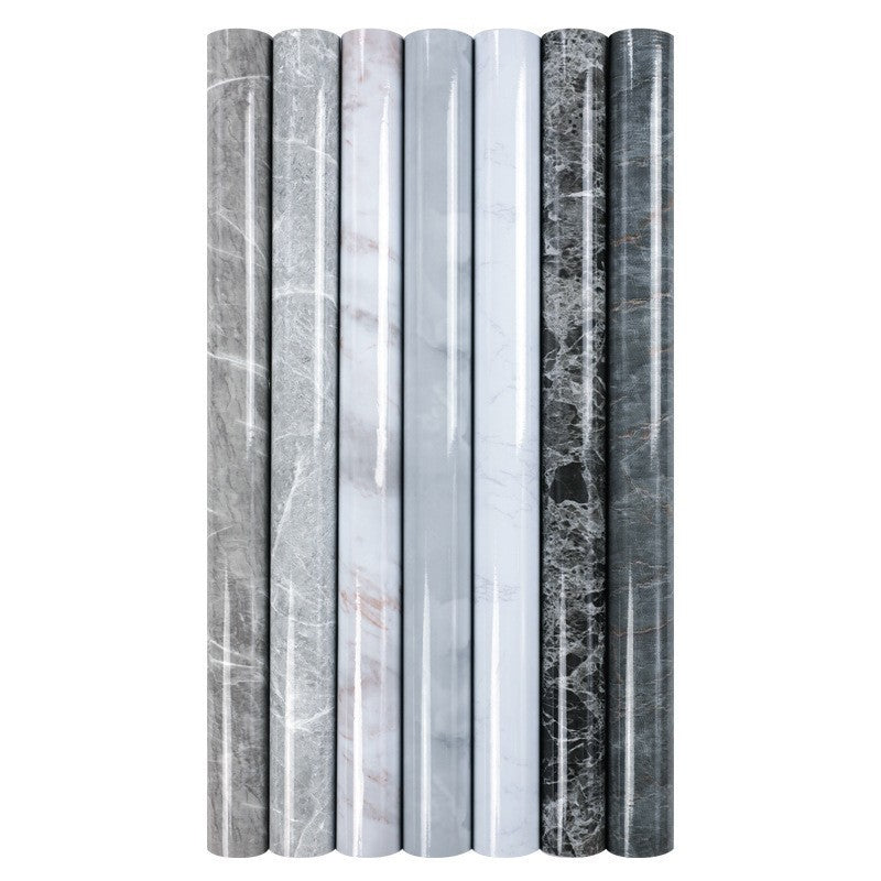 Set of marble rolls with different patterns on a white background