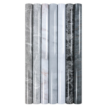 Set of marble rolls with different patterns on a white background