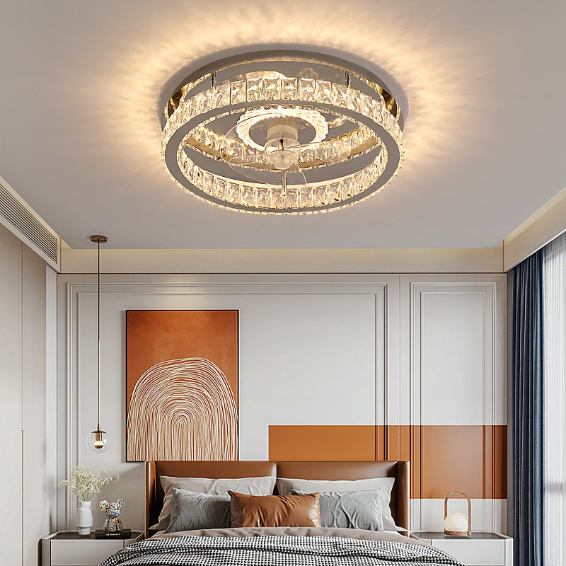 Modern bedroom with a stylish ceiling light fixture.