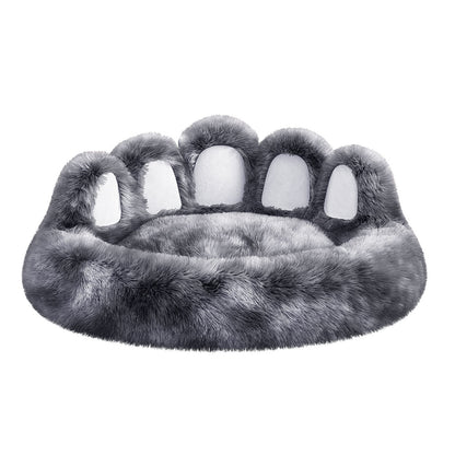 Gray paw-shaped pet bed on a white background