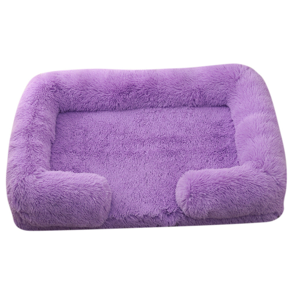 Purple pet bed with soft texture on a white background