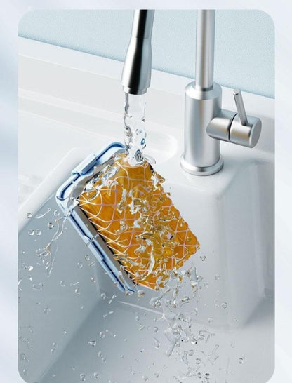 Cleaning tool with water flowing over it, demonstrating ease of use and features.