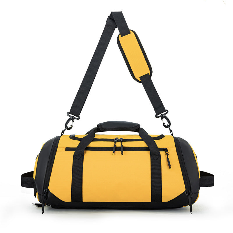 Yellow duffel bag with black straps on a white background