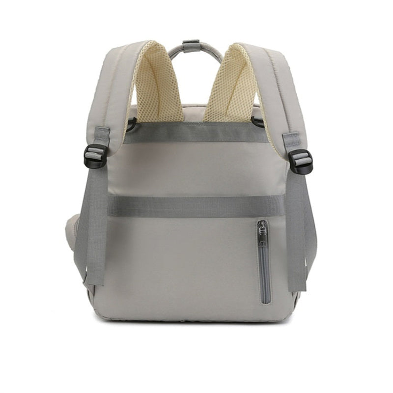 Gray backpack with beige interior on a white background