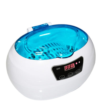White ultrasonic cleaner with blue interior on a white background