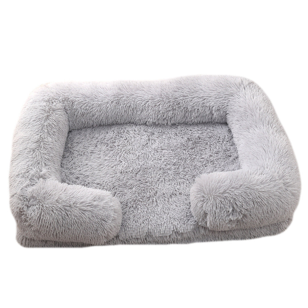 Gray pet bed with fluffy texture on a white background