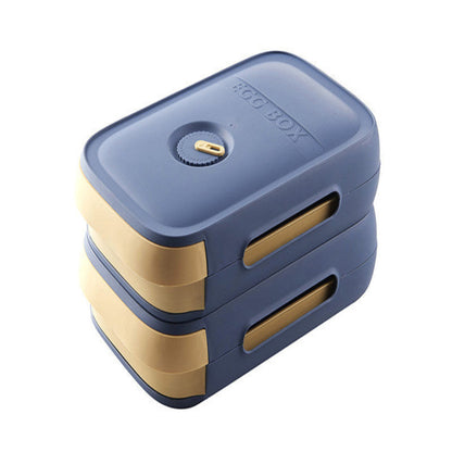 Blue and gold bento box on a white background