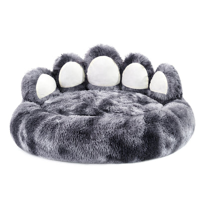 Gray paw-shaped pet bed with white pads on a white background