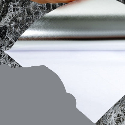 PET aluminum foil material with text on a marble background