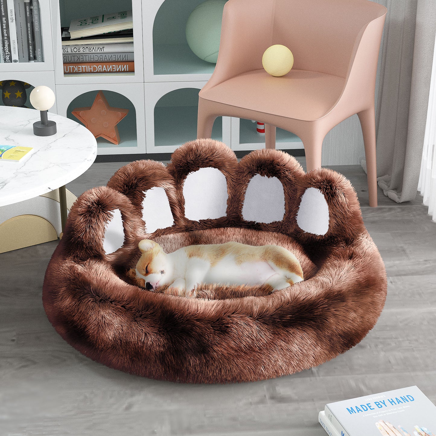 Brown paw-shaped pet bed with a dog inside in a room setting.