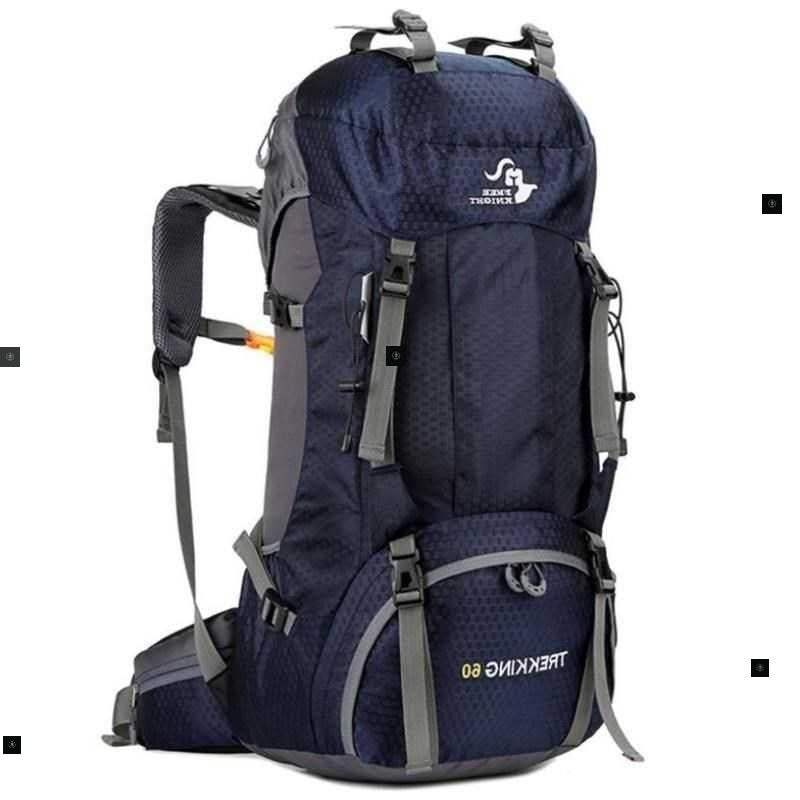 Navy blue hiking backpack with gray straps on a white background