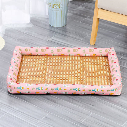 Pink pet bed with wicker design on a gray floor