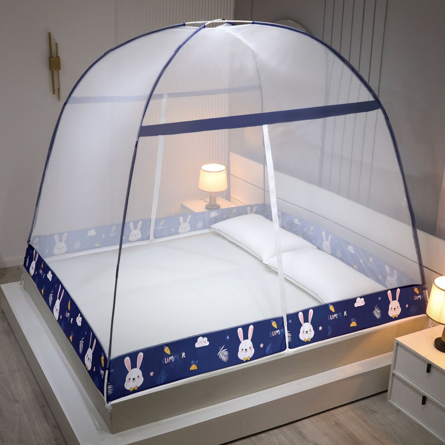 Children's bed with a blue and white canopy in a bedroom setting