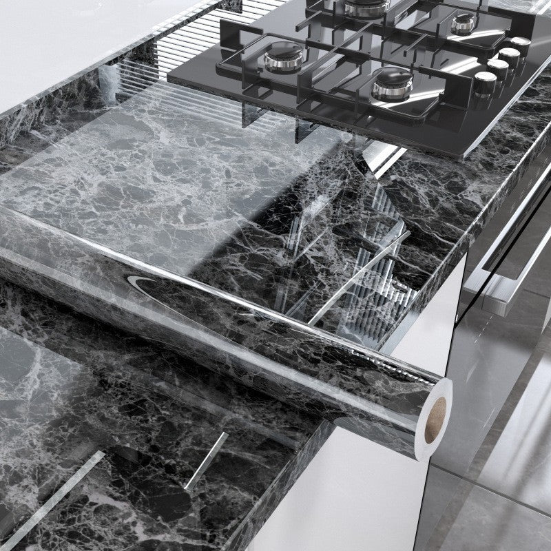 Stainless steel kitchen sink with marble countertop