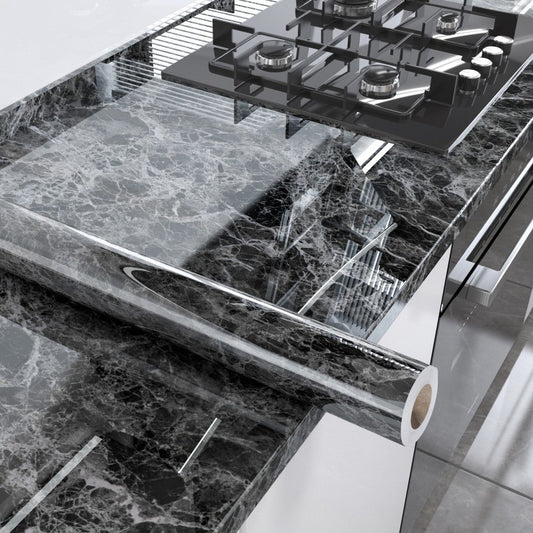 Stainless steel kitchen sink with marble countertop