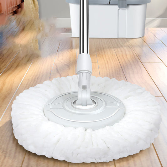 White cleaning mop head on a wooden floor