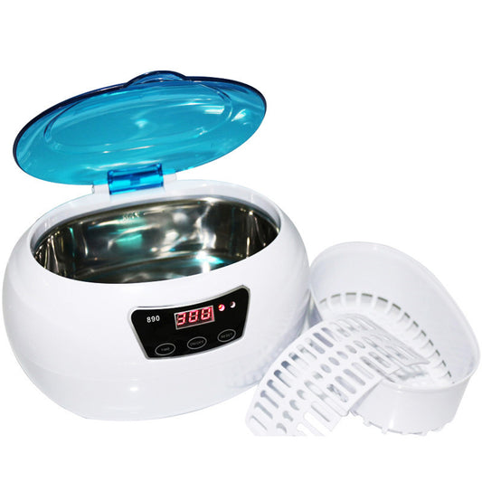 White ultrasonic cleaner with blue lid on a white background