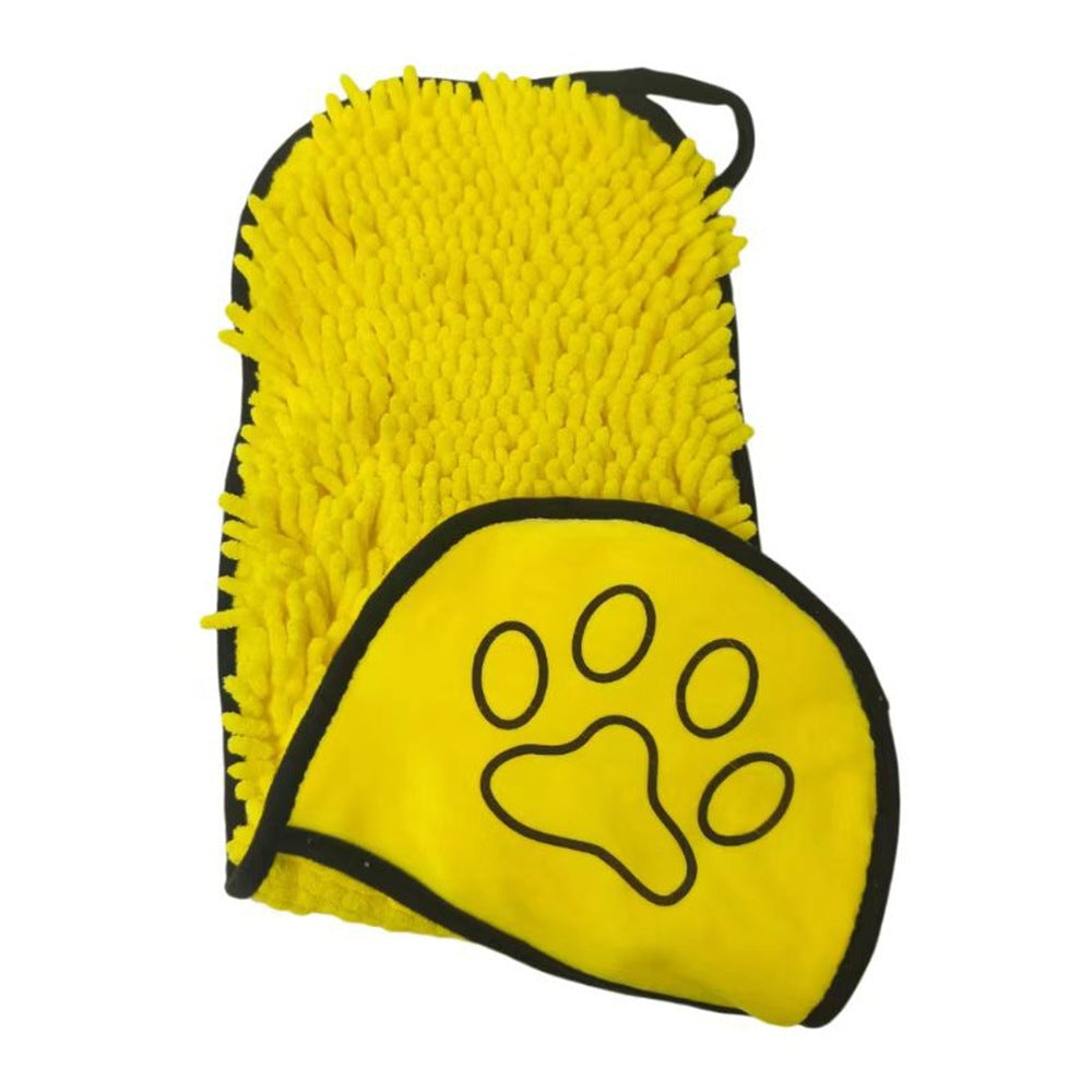 Yellow grooming mitt with a paw print design on a white background