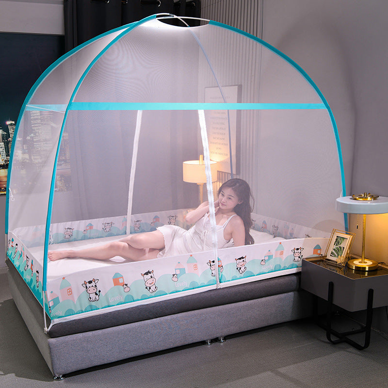 Child in a crib with a blue and white canopy in a bedroom setting.