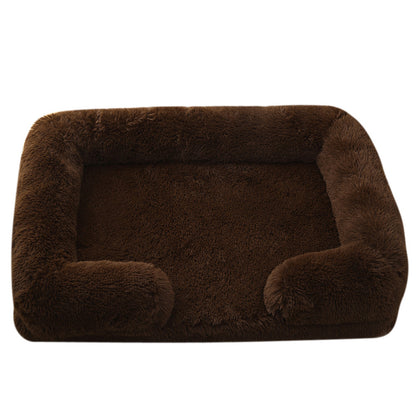 Brown plush pet bed on a white background