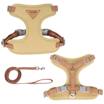 Beige dog harness and leash set with DUOMM branding on a white background.