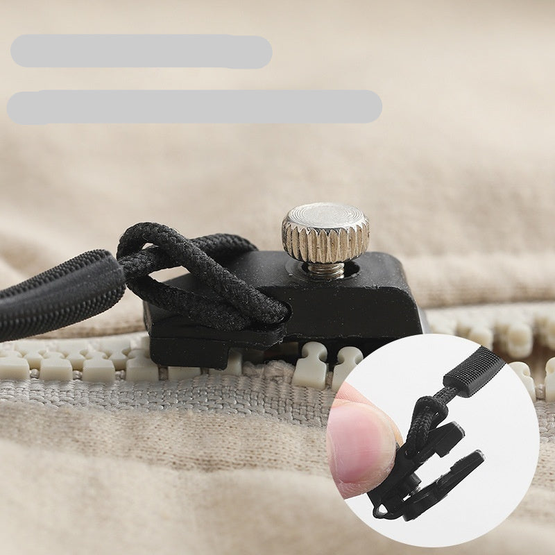 Close-up of a zipper pull with text highlighting high-quality material and durability.