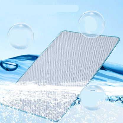 Textured mat with water droplets and text highlighting features on a blue background