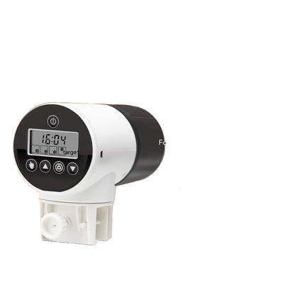 White and black electronic device with digital display on a brown background, labeled 'Extra large food bowl YSQ-750i'.