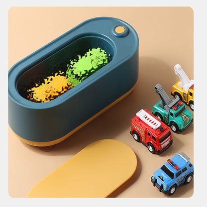 Toy sand table with colorful sand and toy vehicles on a beige background