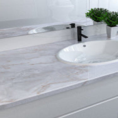 Bathroom sink with marble countertop and faucet