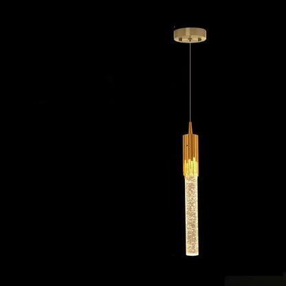 Gold pendant light with measurements on a black background