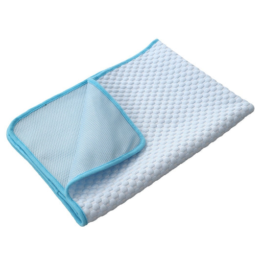 White textured pillow with blue mesh side on a white background