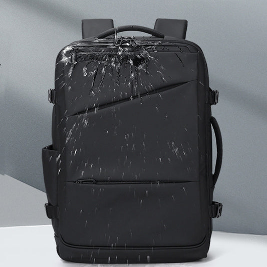 Black backpack with water splashes on a gray background