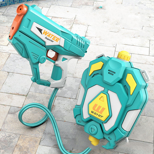 Two turquoise water guns with yellow accents on a tiled floor.